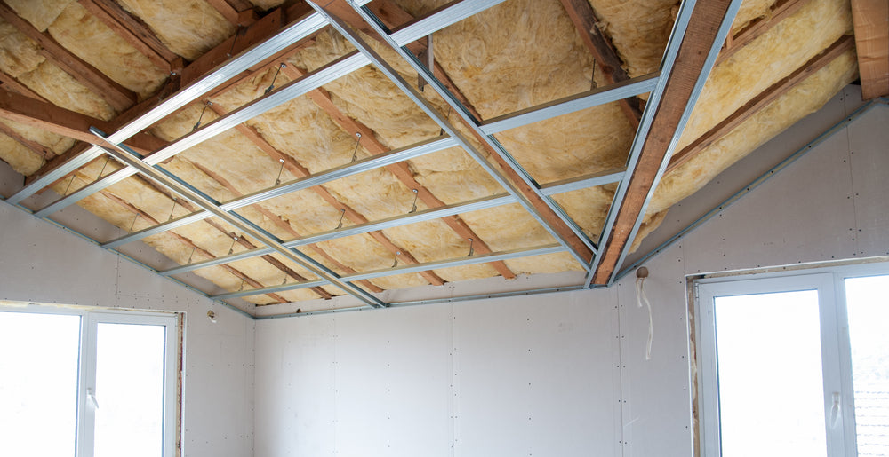 Ceiling insulation batts installed between steel battens